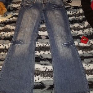Distressed jeans with bling